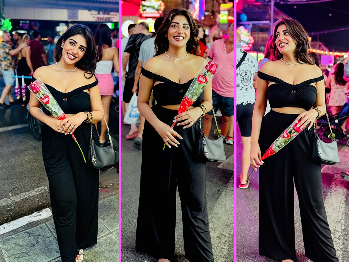Suprita with a rose on the road for someone1