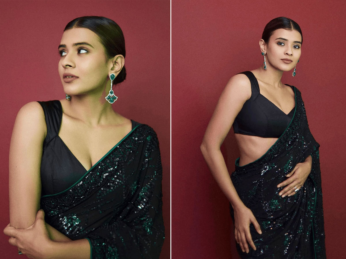 Actress Hebba Patel Shares New Photos In Black Saree 1