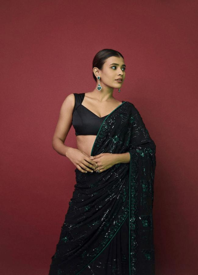 Actress Hebba Patel Shares New Photos In Black Saree 5