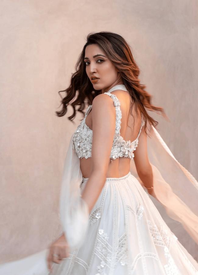 Actress Neha Shetty Mesmerizing Photos In White Gown5