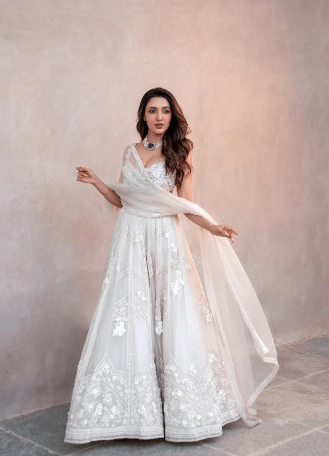 Actress Neha Shetty Mesmerizing Photos In White Gown6