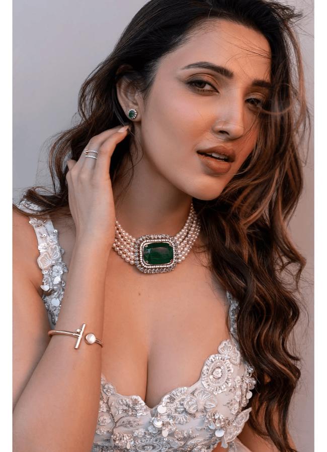 Actress Neha Shetty Mesmerizing Photos In White Gown8