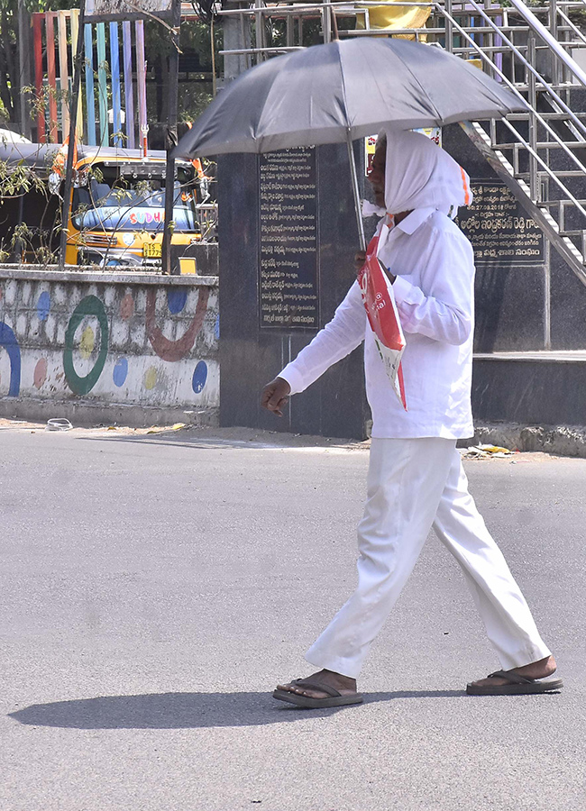 Rise in day temperatures in telugu state photos26