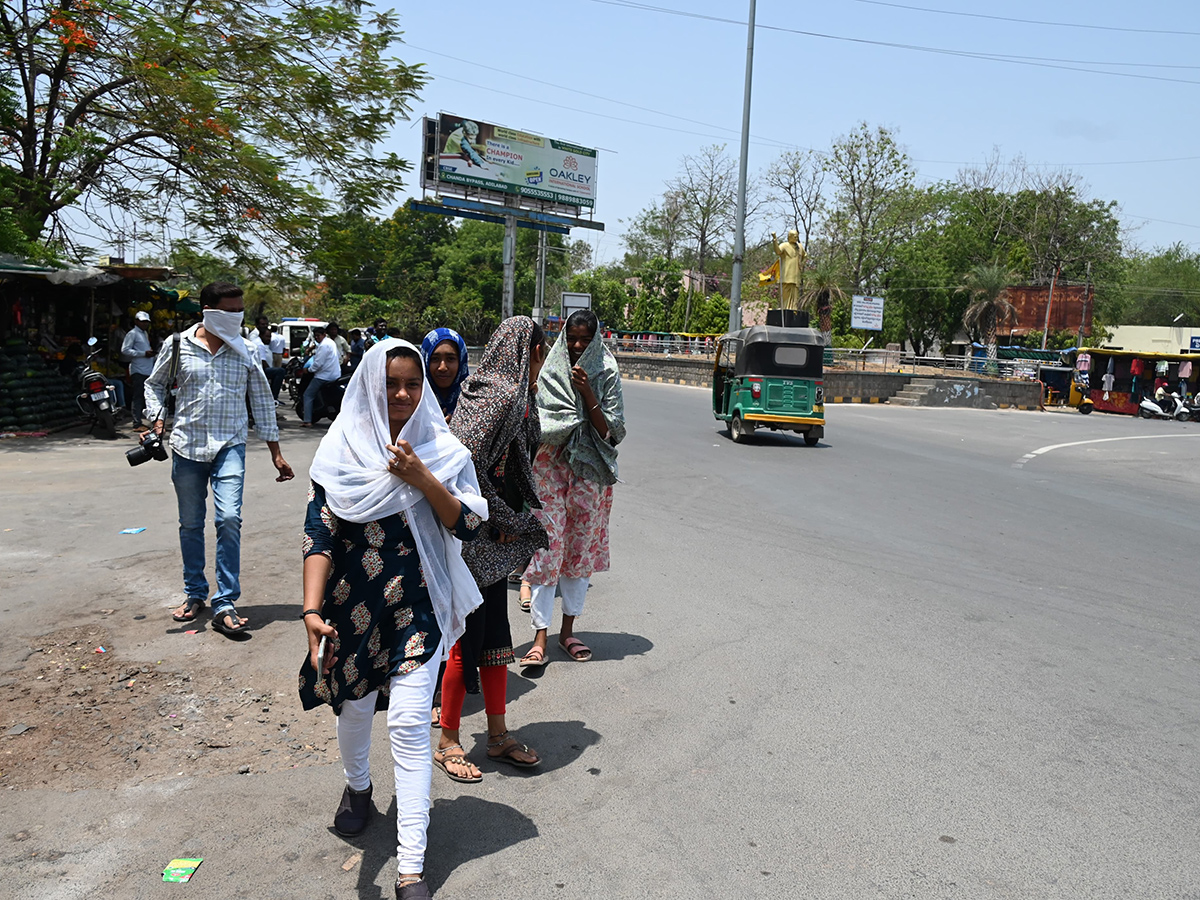 Rise in day temperatures in telugu state photos6
