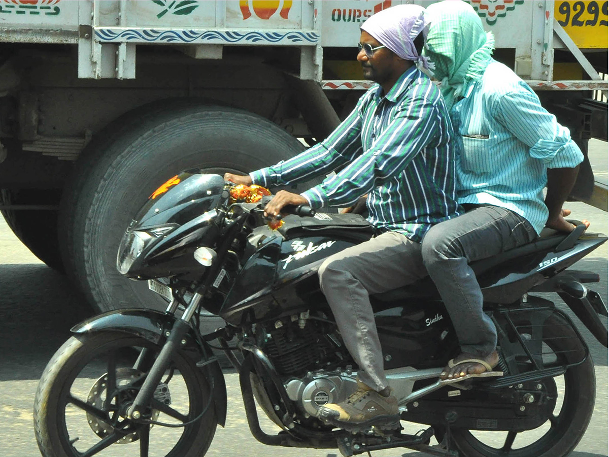 Rise in day temperatures in telugu state photos9