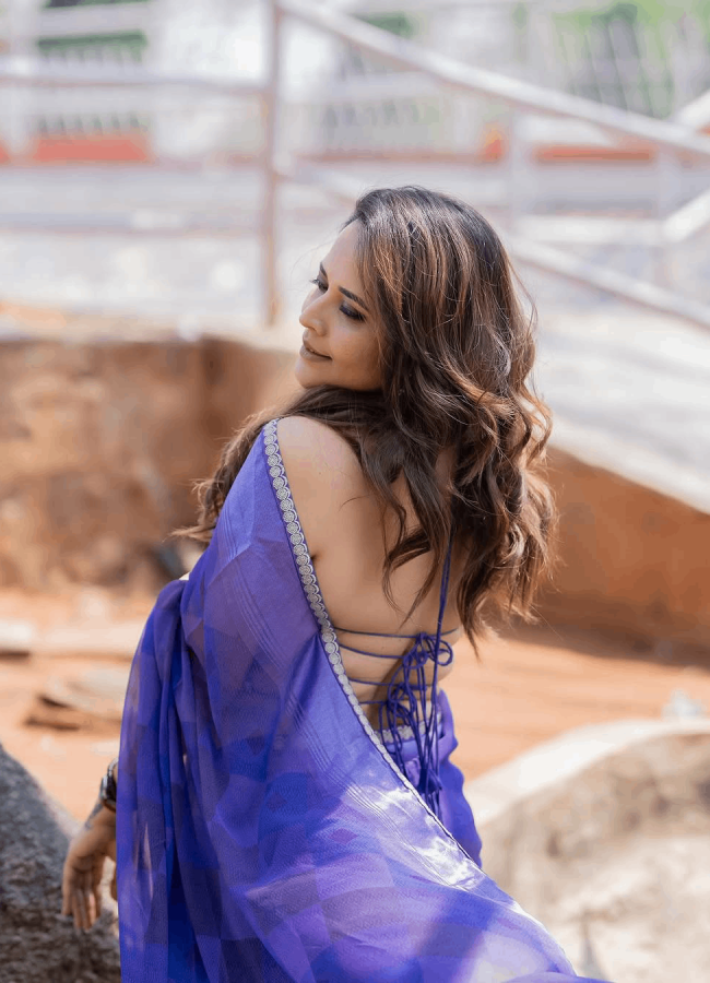 Actress Anasuya Bharadwaj Mesmerizing Photos In Blue Saree5