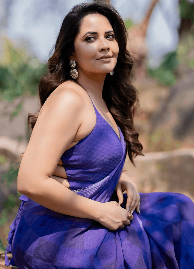 Actress Anasuya Bharadwaj Mesmerizing Photos In Blue Saree6