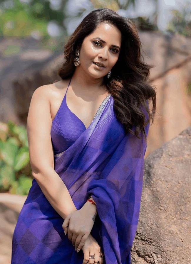 Actress Anasuya Bharadwaj Mesmerizing Photos In Blue Saree8