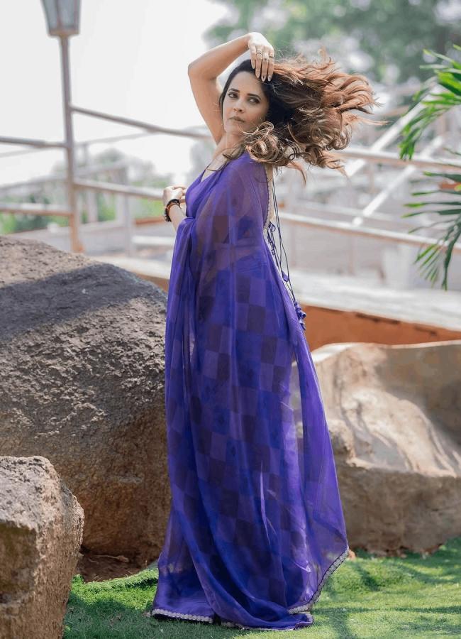 Actress Anasuya Bharadwaj Mesmerizing Photos In Blue Saree9