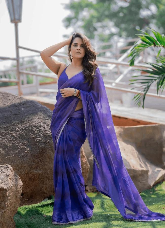 Actress Anasuya Bharadwaj Mesmerizing Photos In Blue Saree11