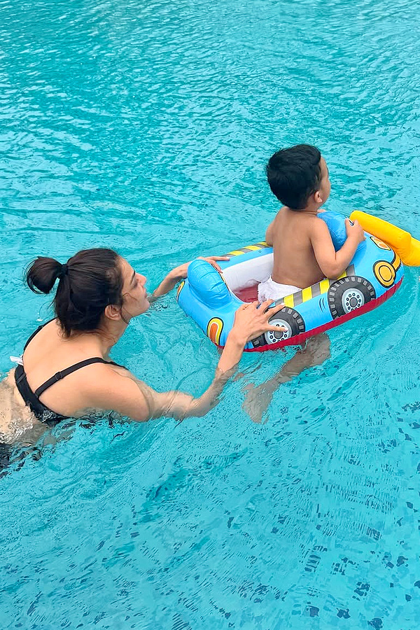 Actress Kajal Aggarwal cute moments With Son Photos3