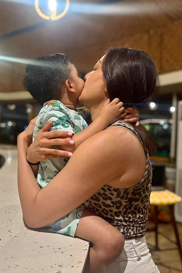 Actress Kajal Aggarwal cute moments With Son Photos4