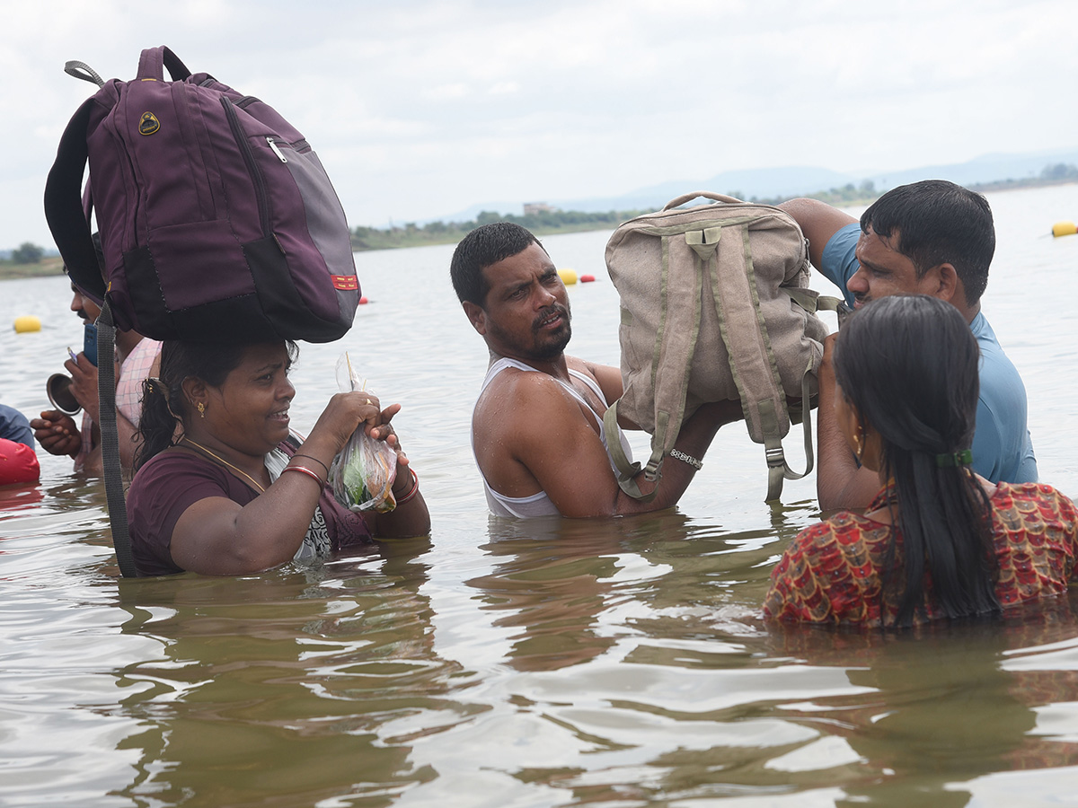 Devotees throng the final day of the Saraswati River Pushkaram Photos9