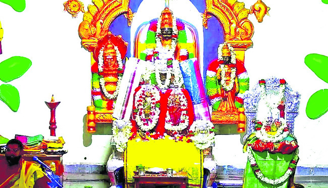 సీతారాములకు వెండి మకర తోరణం అలంకరణ
1