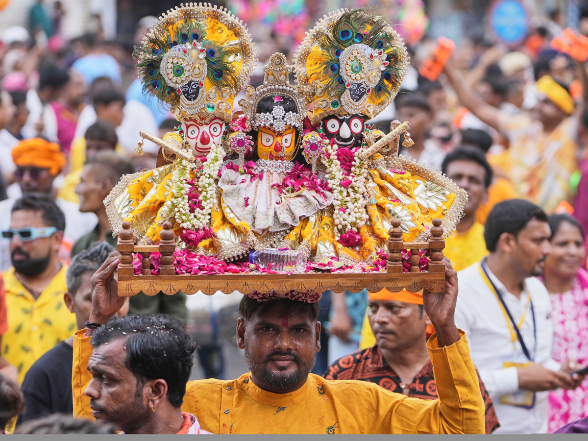 Devotees Gather For Grand Rath Yatra Of Lord Jagannath In Puri Photos11