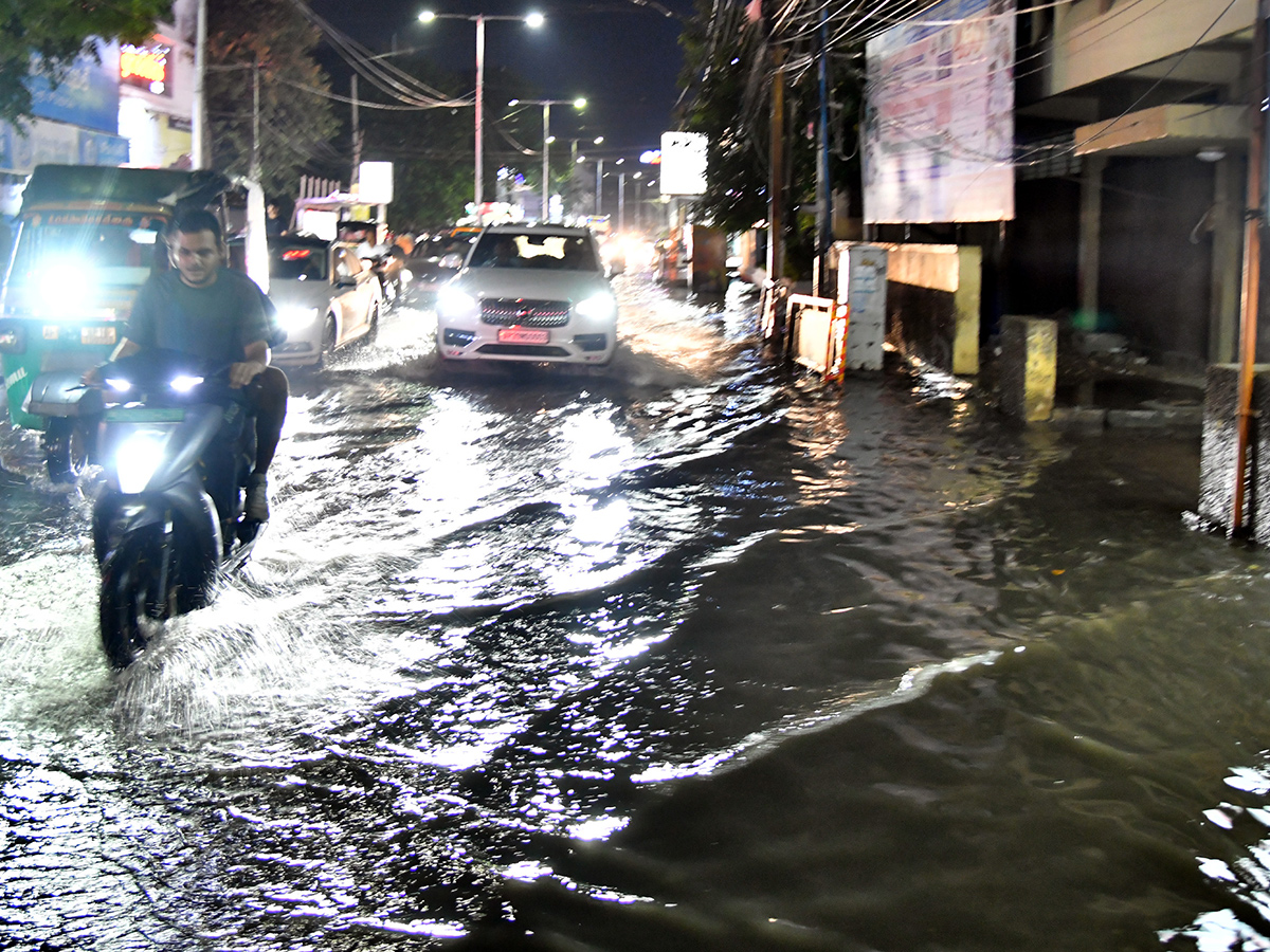heavy rain in vijayawada photos16