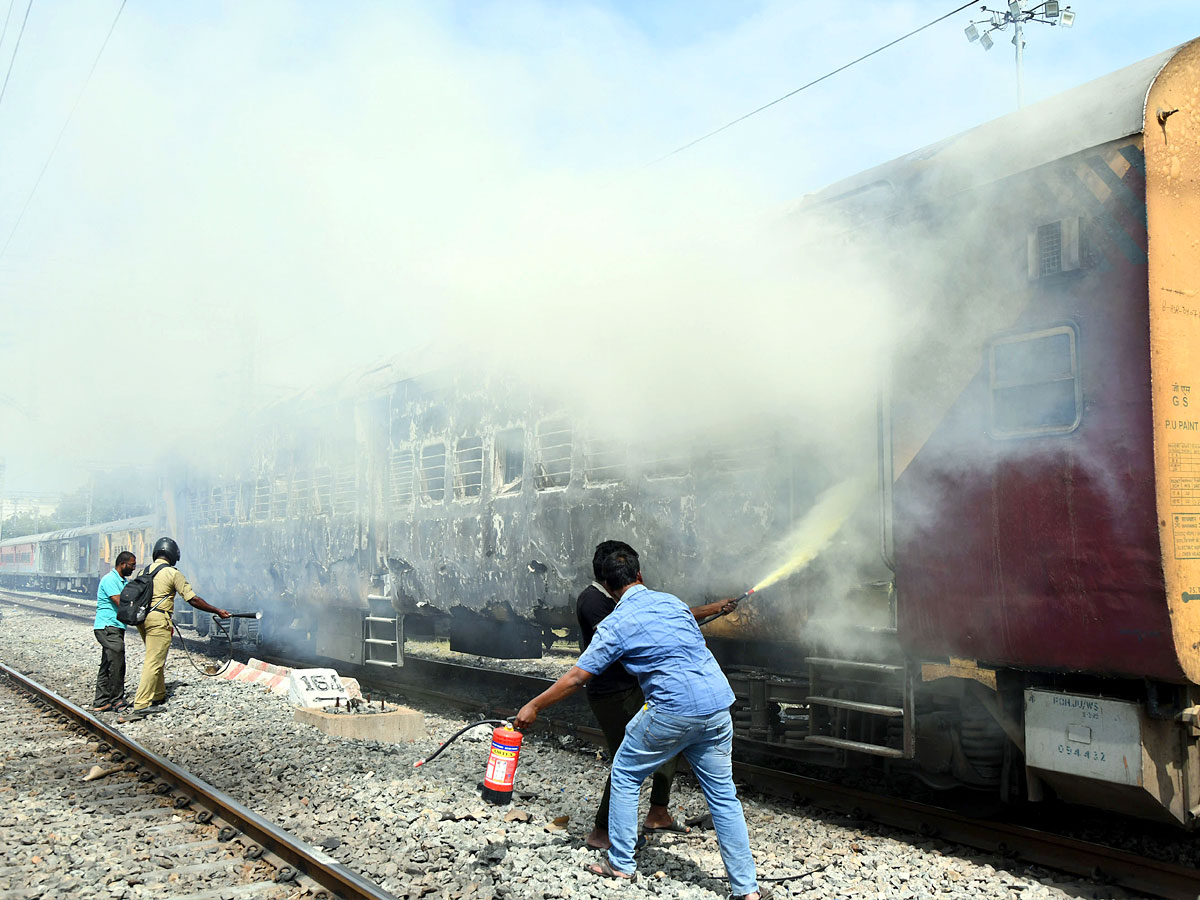 Fire breaks out in coaches of express Trains Near Tirupati Photos12
