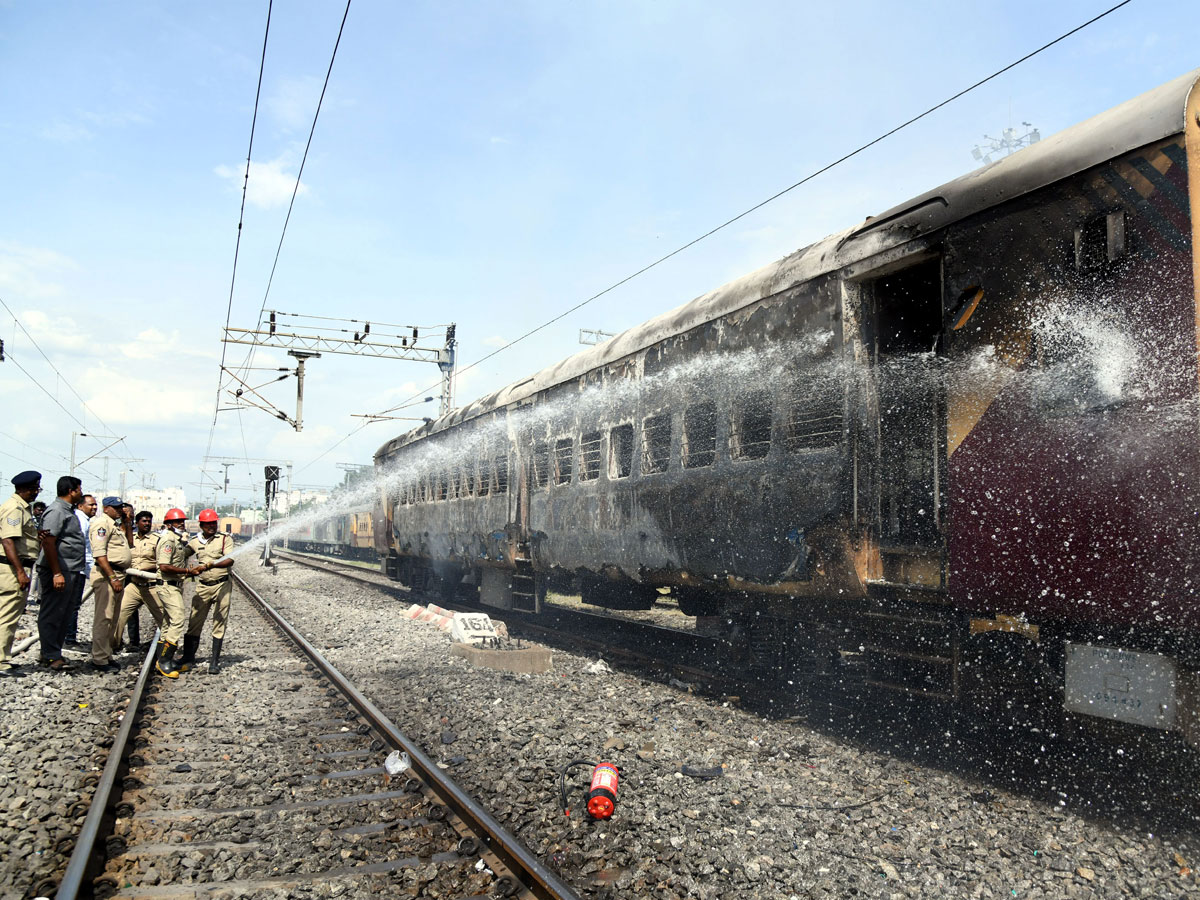 Fire breaks out in coaches of express Trains Near Tirupati Photos14