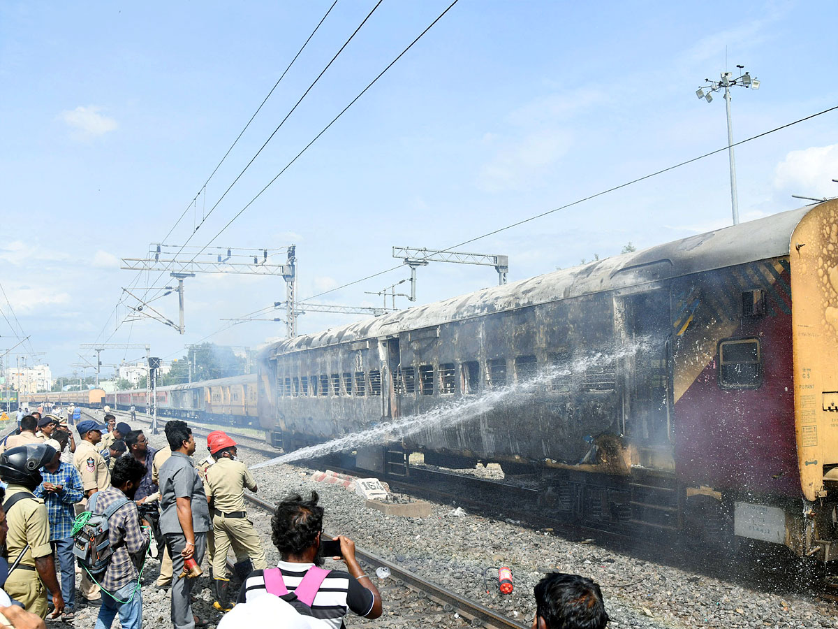 Fire breaks out in coaches of express Trains Near Tirupati Photos15
