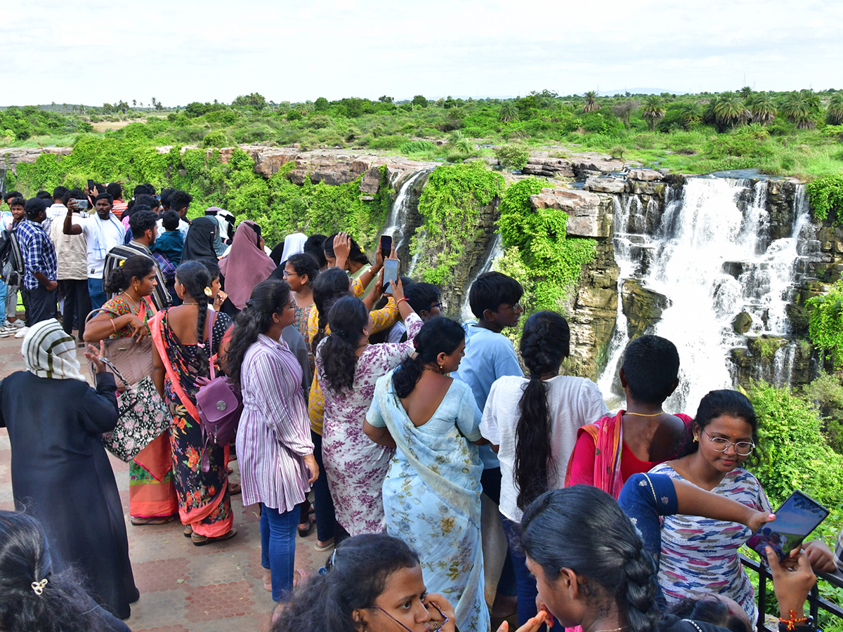 Tourists Enjoy Rushing Flood Water in Nagarjuna Sagar12