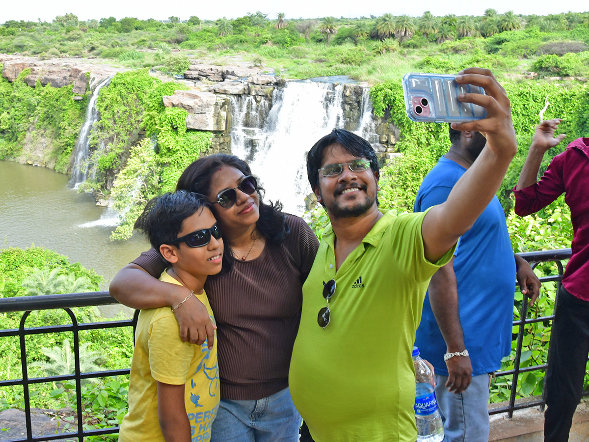 Tourists Enjoy Rushing Flood Water in Nagarjuna Sagar13