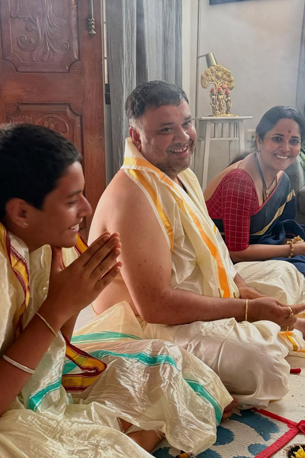 Anchor Anasuya Performs special pooja in home by Family Photos10