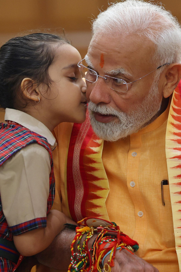 Prime Minister Narendra Modi celebrates Raksha Bandhan with kids Photos3