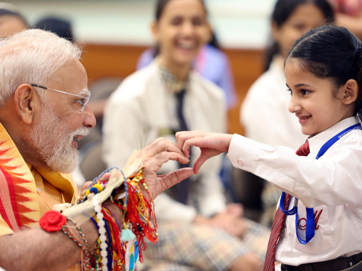 Prime Minister Narendra Modi celebrates Raksha Bandhan with kids Photos6