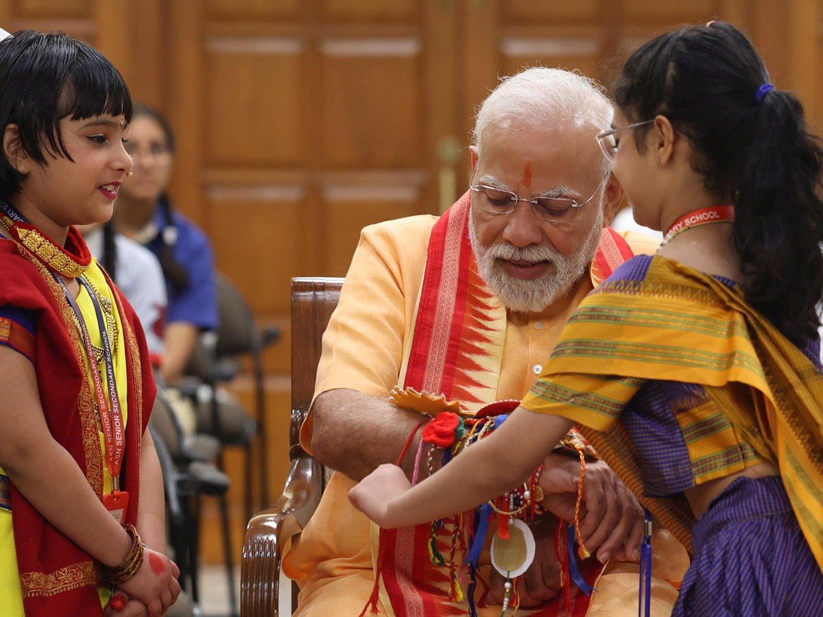 Prime Minister Narendra Modi celebrates Raksha Bandhan with kids Photos7