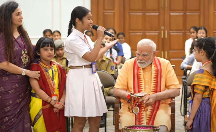 Prime Minister Narendra Modi celebrates Raksha Bandhan with kids Photos9