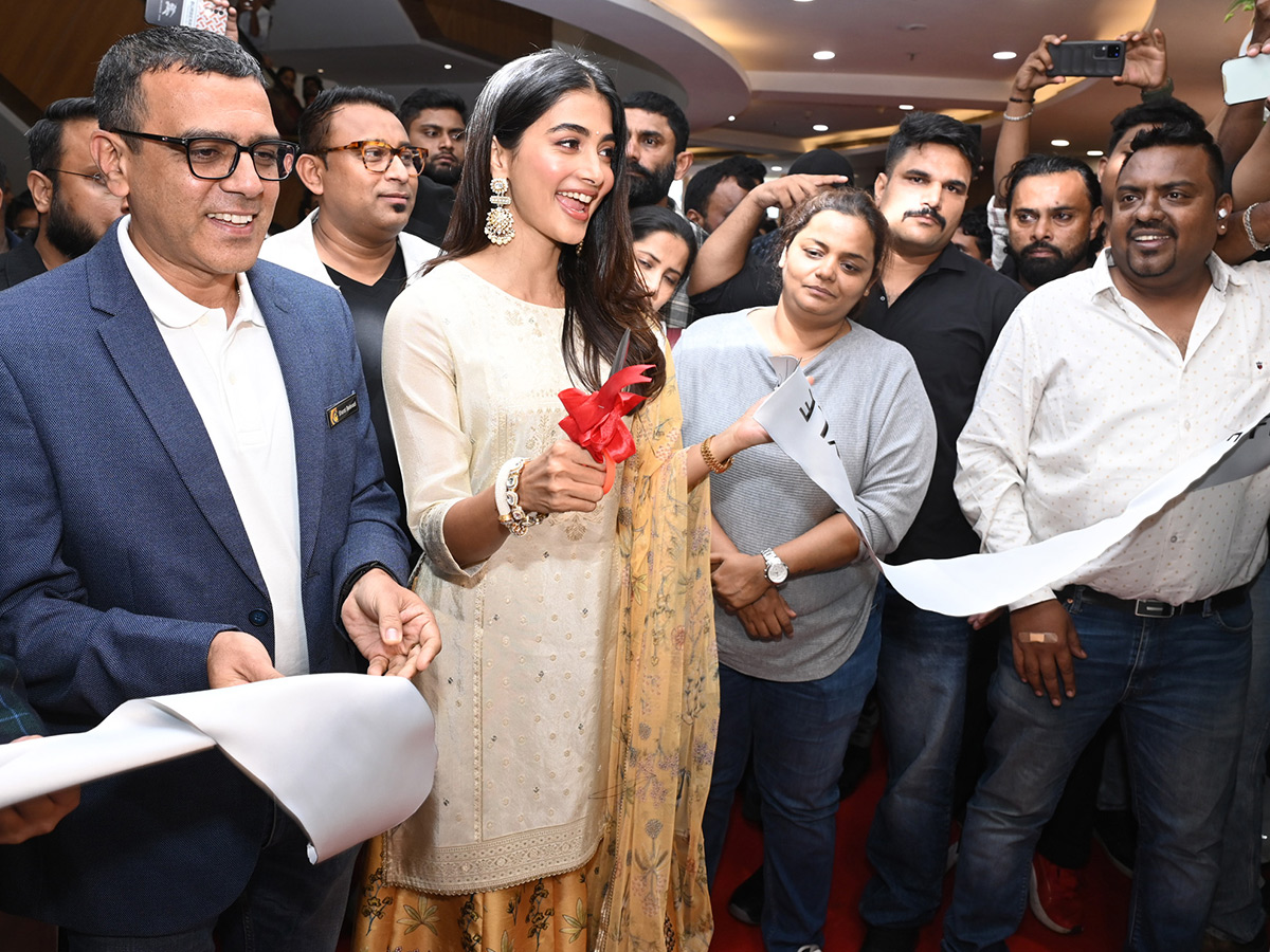 Actress Pooja Hegde buzz in Madhapur Photos 5