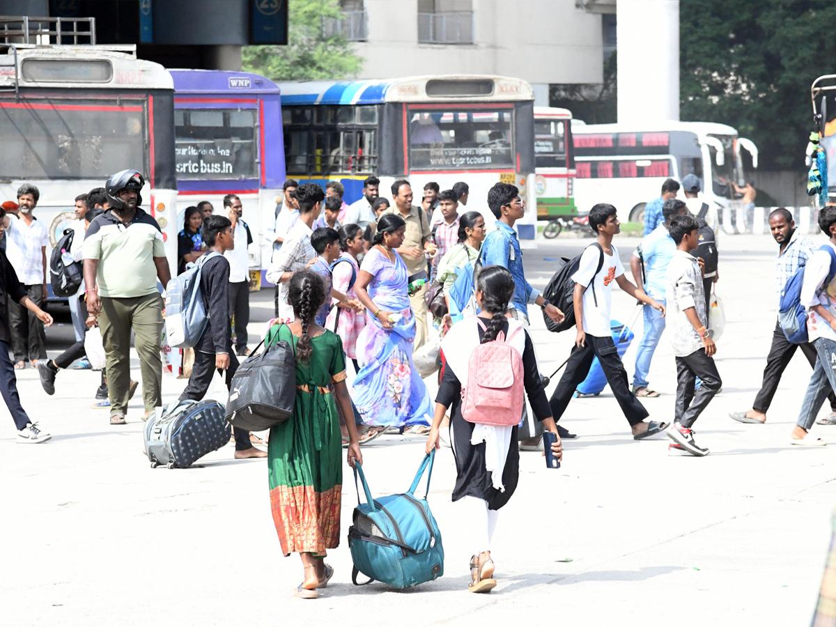 Heavy Rush At bus ANd Railway stations During Dussehra Holidays Photos10