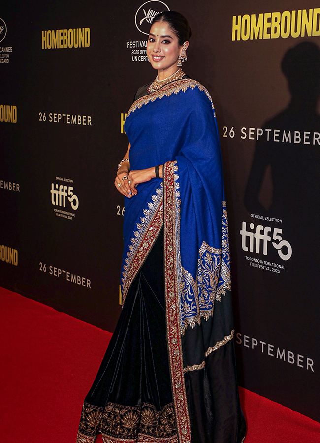 Janhvi Kapoor poses for photos during the premiere of the film Homebound19