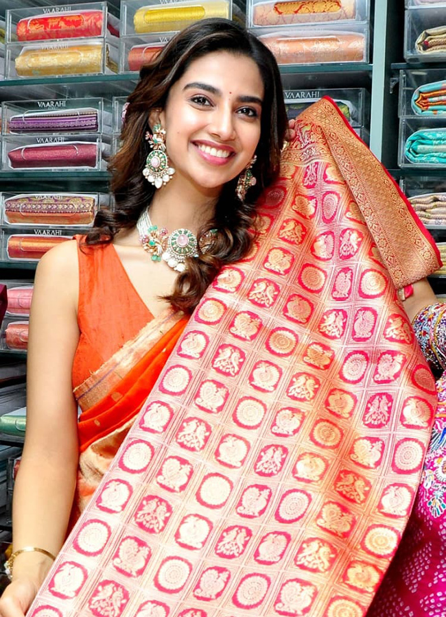 Heroine Meenakshi Chaudhary and anchor Suma in Nellore16