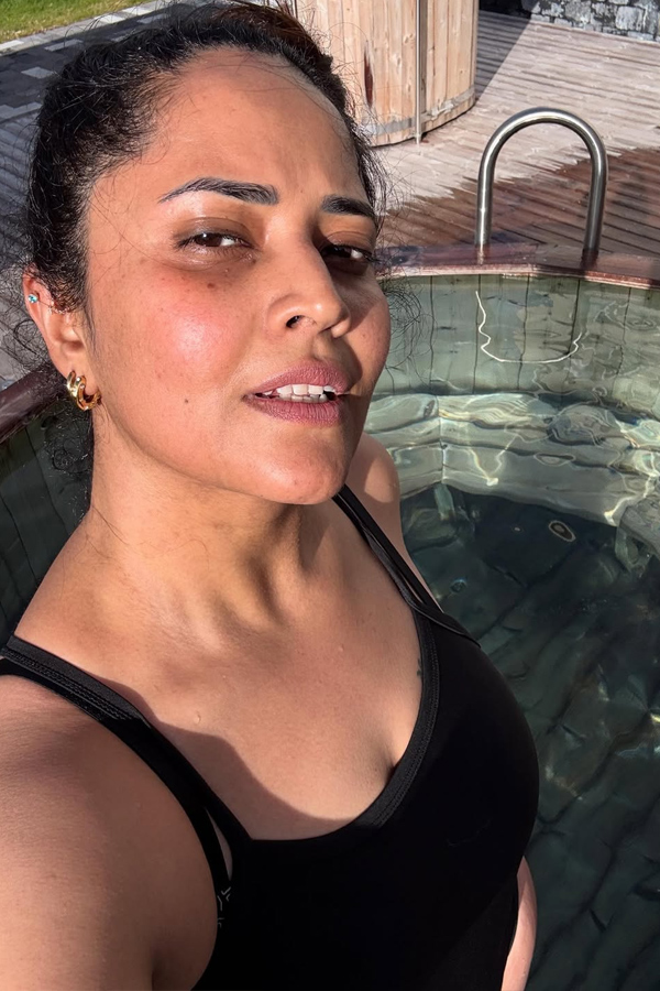 Actress Anasuya Hottest Photo shoot IN Bikini Pictures15