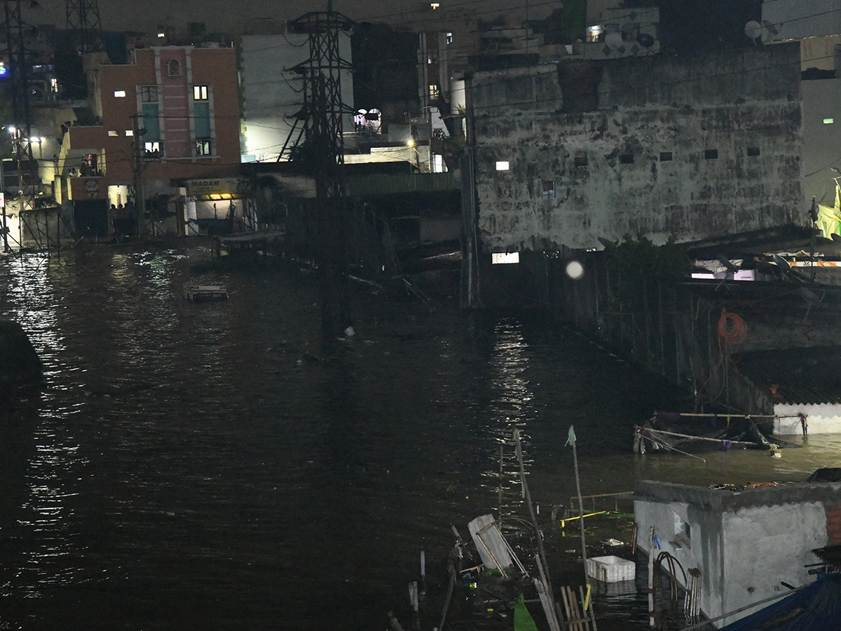 Heavy Flood Water Flows At Musi River In Hyderabad10