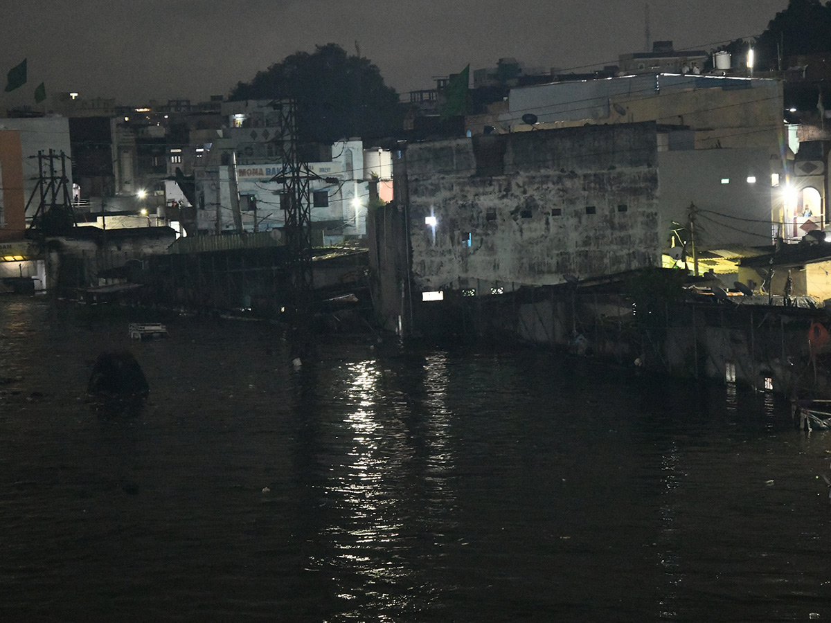Heavy Flood Water Flows At Musi River In Hyderabad12
