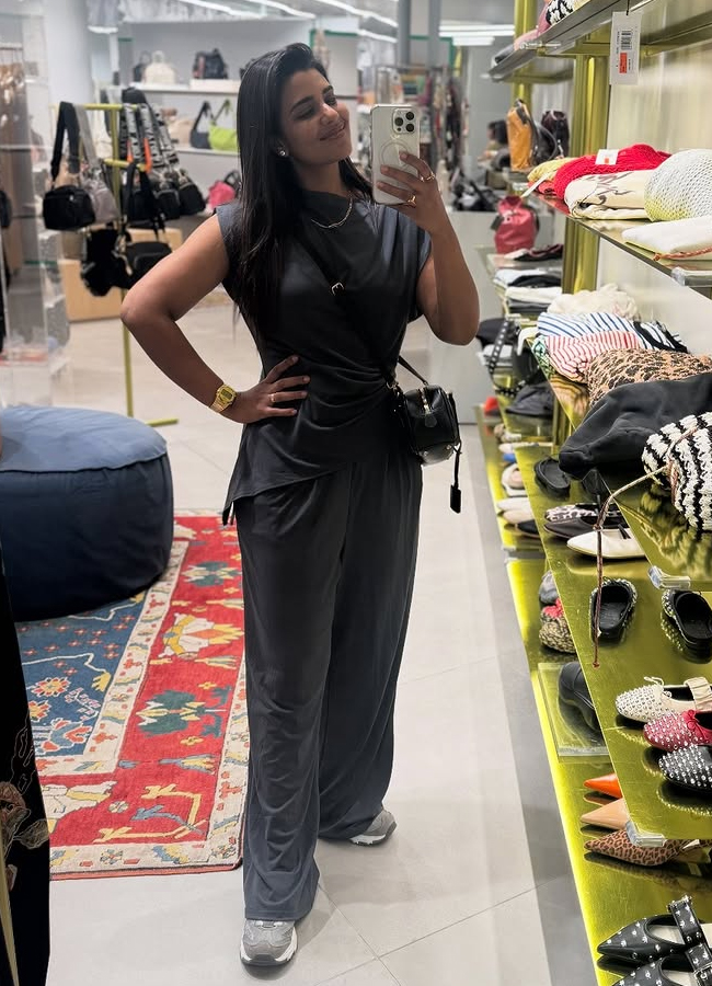 Sankranti movie lead actress is chilling in Singapore photos2