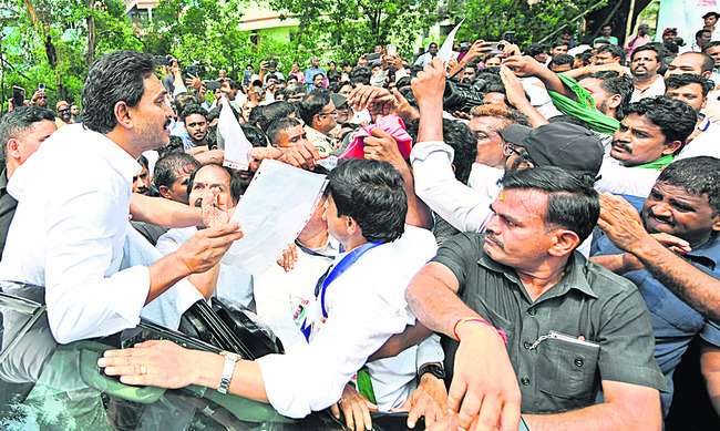 Former CM Jagan receiving a petition from members of the Steel Conservation Struggle Committee7