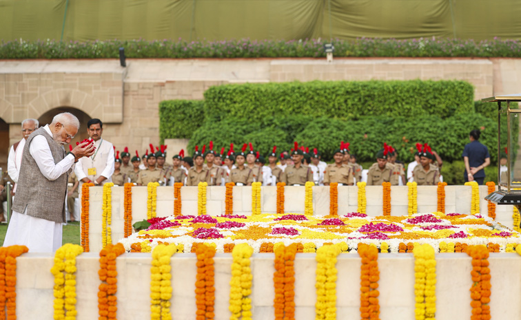 PM Modi pays tribute to Mahatma Gandhi on occasion of his birth anniversary at Rajghat in New Delhi Photos5