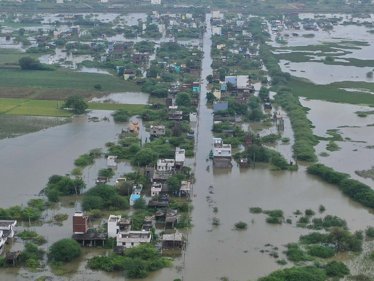 Cyclone Montha Effect : Heavy Floods In Warangal Photos32