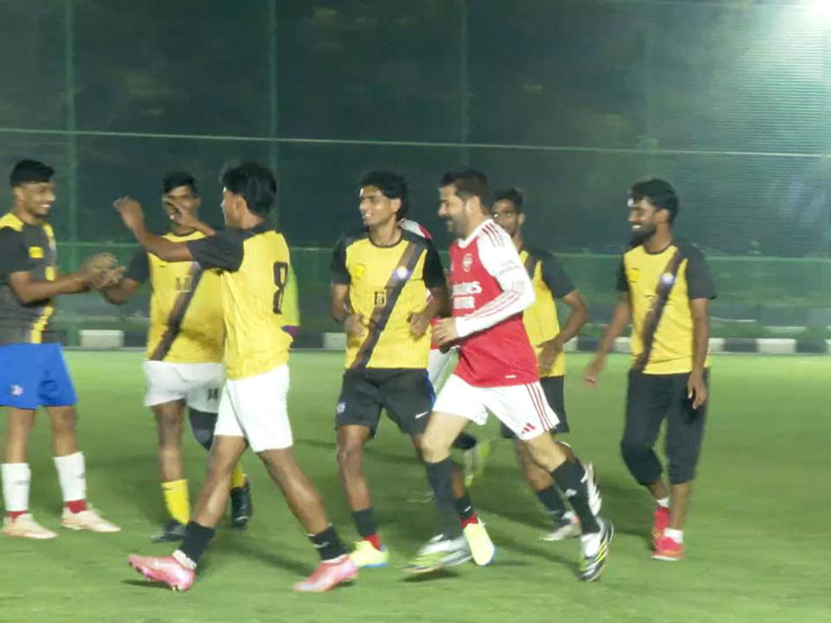 CM Revanth Reddy Practices Football To Face Messi in Hyderabad15