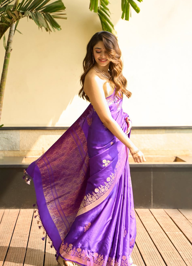 Krithi Shetty in a colorful saree The beauty shared photos for her fans.16
