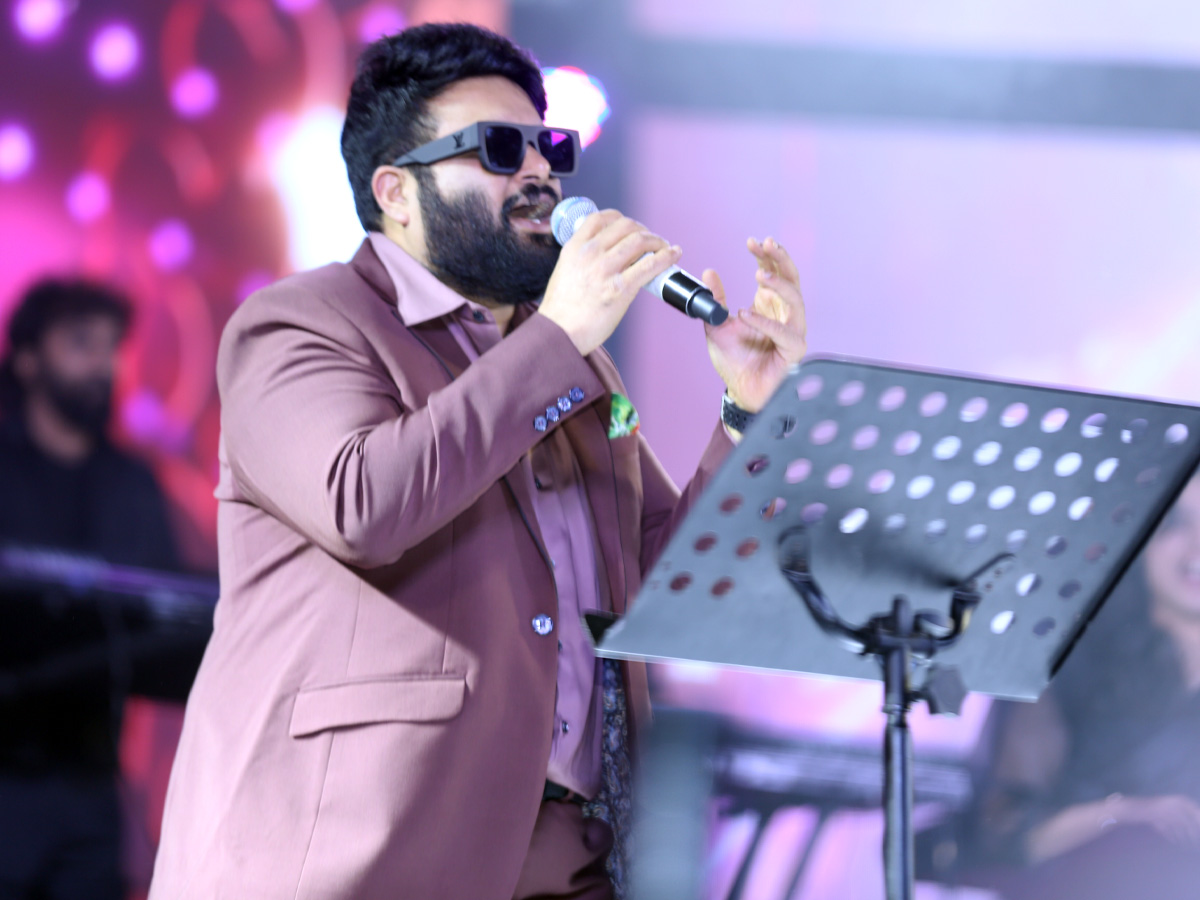 Fans created a buzz at Prabhas's Raja Saab pre-release event Photos.15