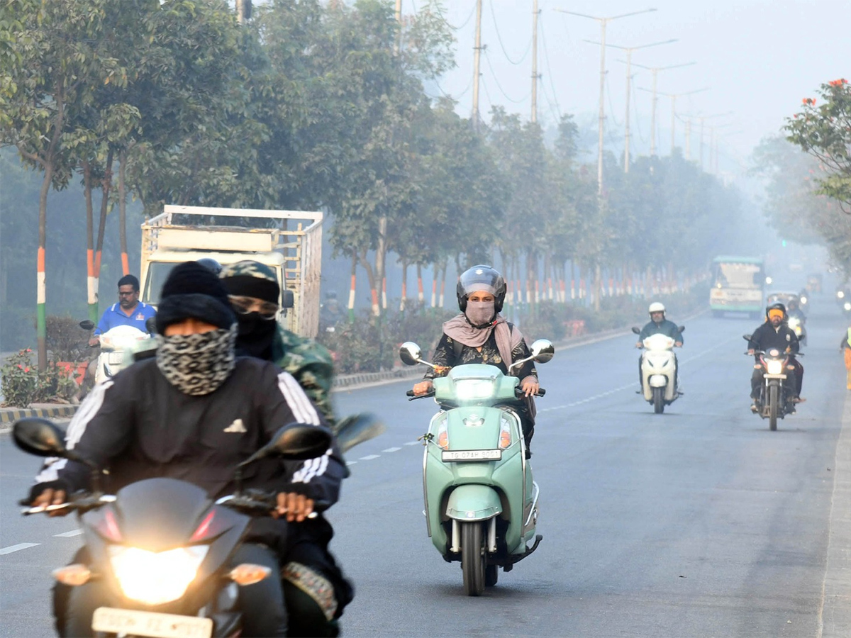 Cold Wave : Dense Fog Envelops Hyderabad Photos11
