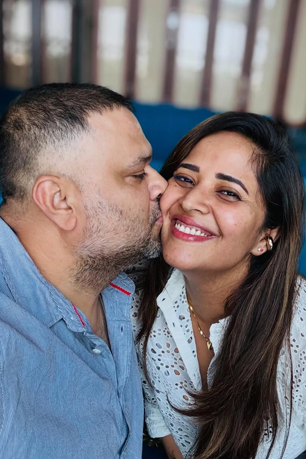 Anchor Anasuya Bharadwaj Welcomes 2026 With Her Husband in Pool Photos13
