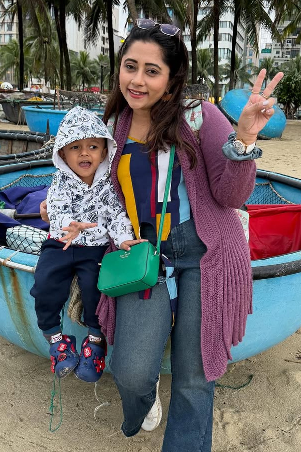 TV Actress Lahari At The beach with Her Son Photos17