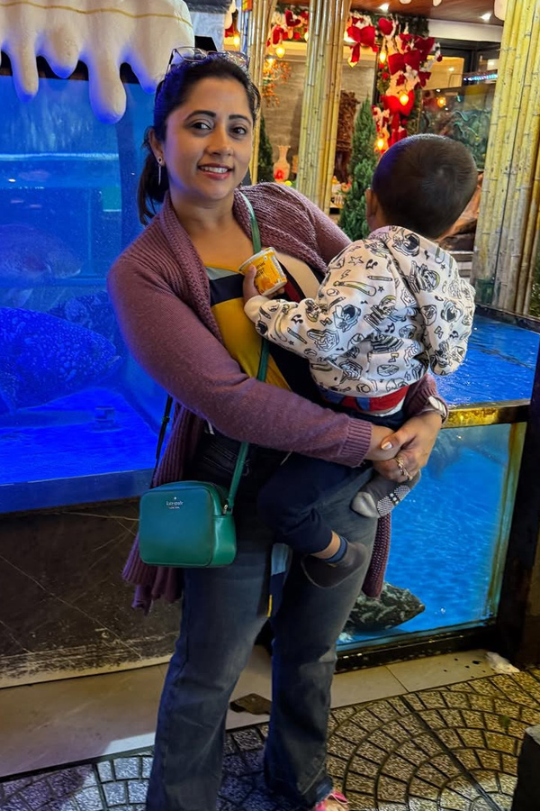 TV Actress Lahari At The beach with Her Son Photos18