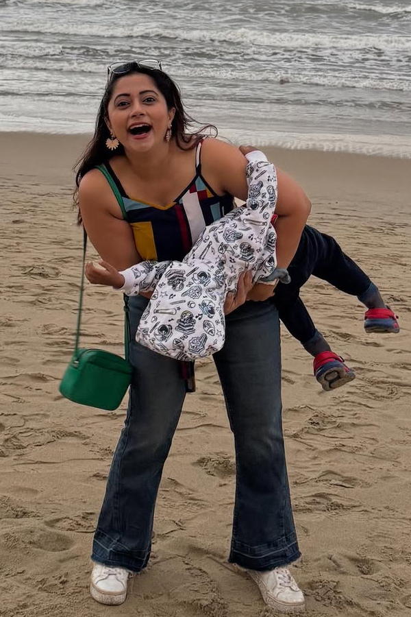 TV Actress Lahari At The beach with Her Son Photos8