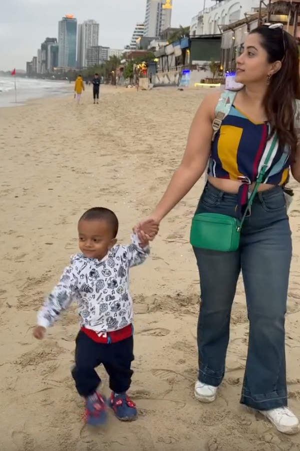 TV Actress Lahari At The beach with Her Son Photos9